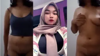 Fitria Dewi Berjilbab Montok Dengan Payudara Besar Yang Menggairahkan